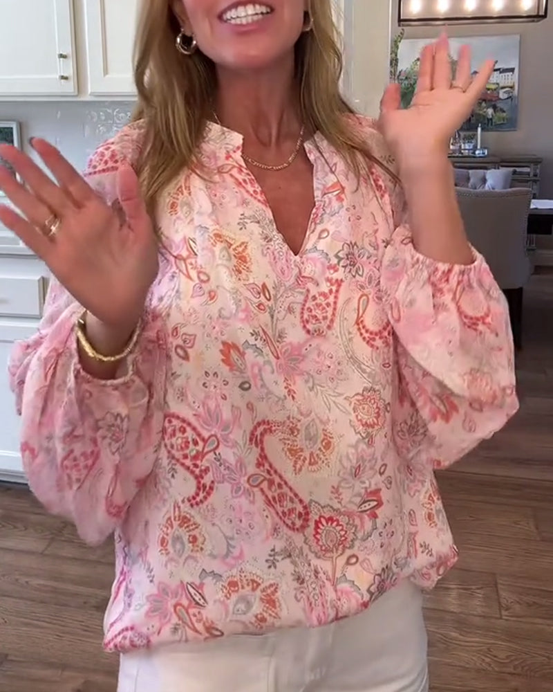 Bluzka z bufiastymi rękawami i kwiatowym nadrukiem