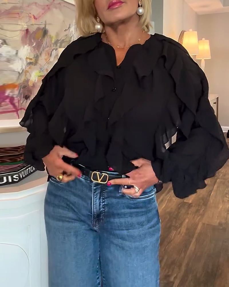 Luźna, prosta bluzka z falbankami