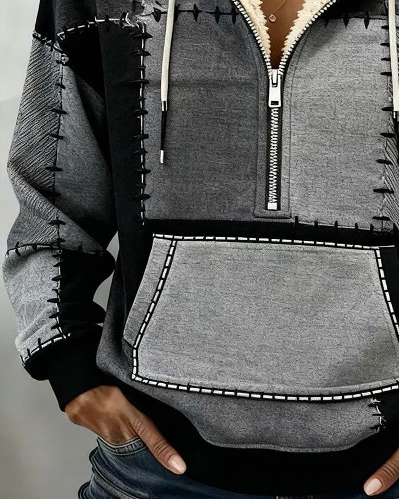 Sweter z kapturem, zapinany na pół suwaka i kieszenią