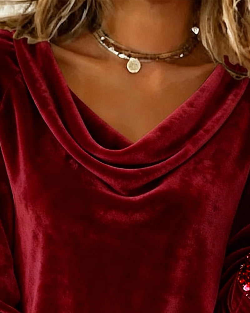 Aksamitny top z drapowanym kołnierzykiem i cekinami