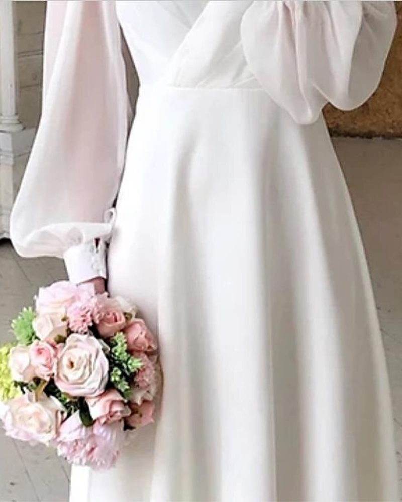 Sukienka Elegancka z bufiastymi rękawami i dekoltem w serek