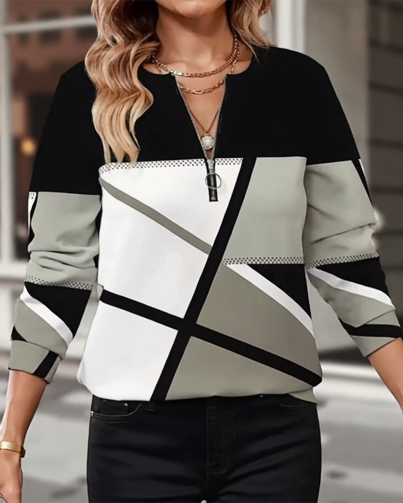 Koszulka zapinana na zamek z geometrycznym wzorem