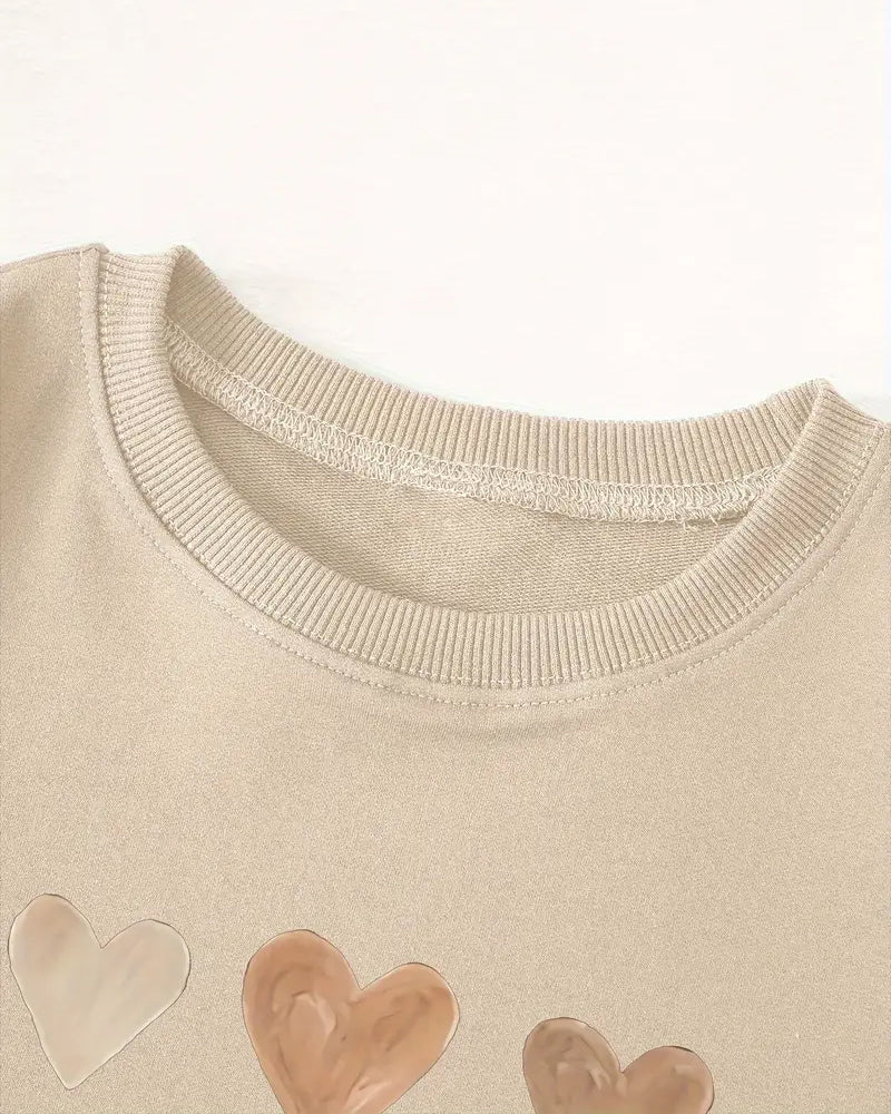 Kolorowy sweter w kształcie serca