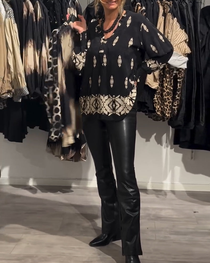 Koszula z dekoltem w serek i rękawami typu „latarnia”