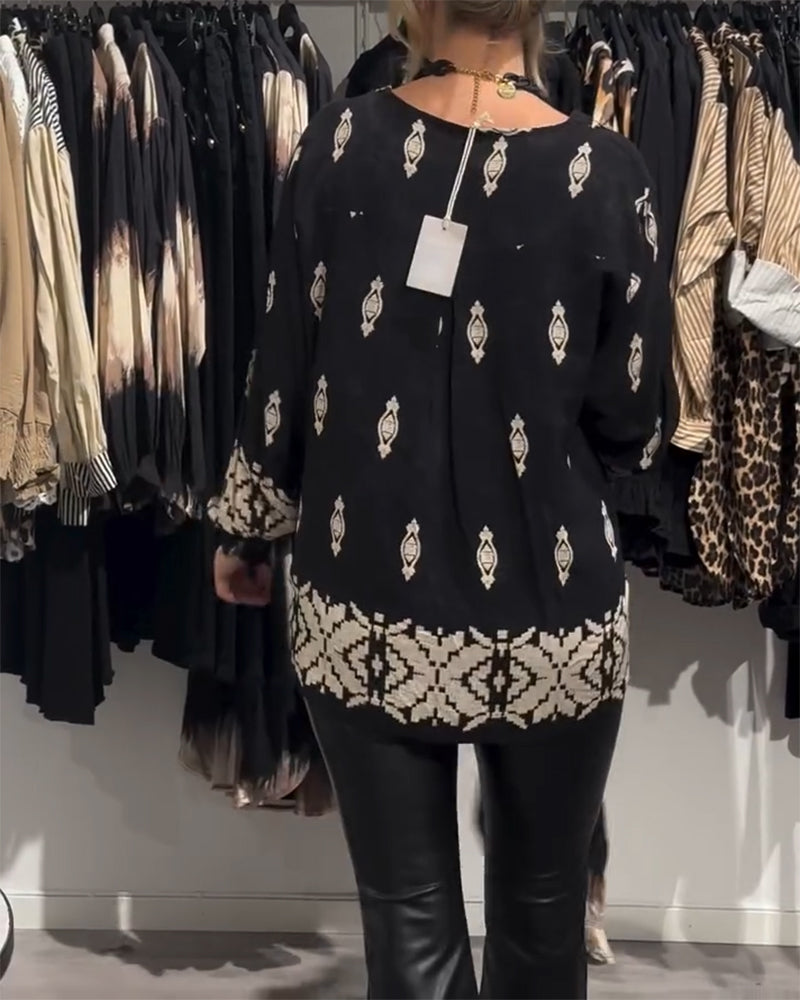 Koszula z dekoltem w serek i rękawami typu „latarnia”