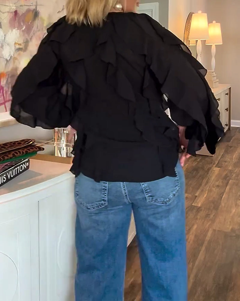 Luźna, prosta bluzka z falbankami