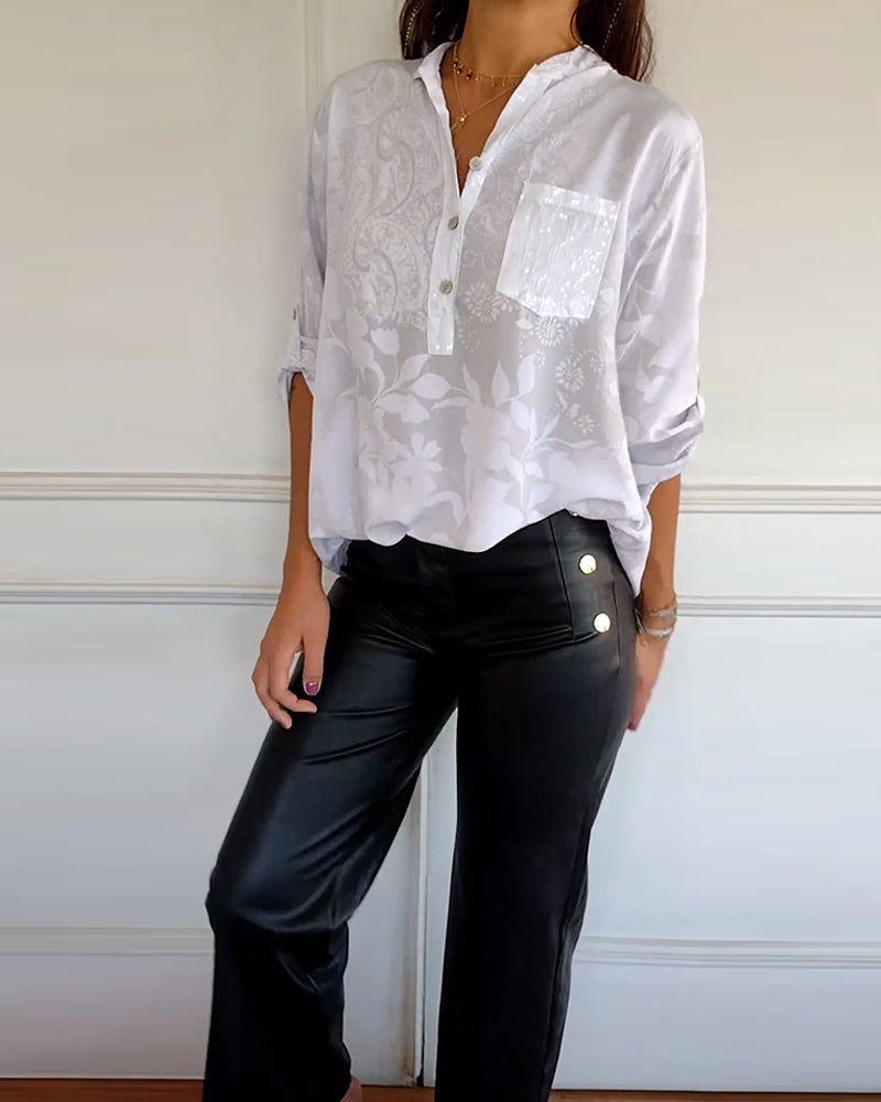 Elegancki top w jednolitym kolorze z kieszenią na guziki