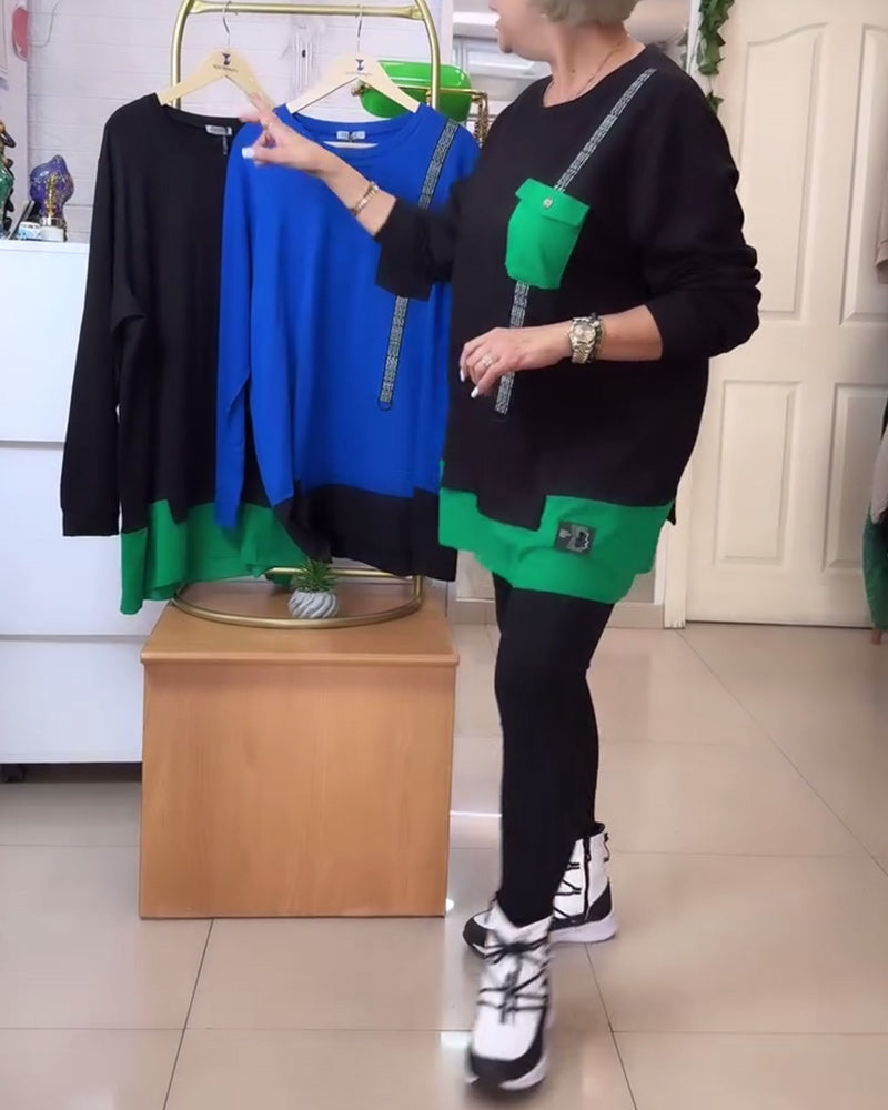 Luźna bluza z okrągłym dekoltem, kieszeniami i kontrastowymi kolorami