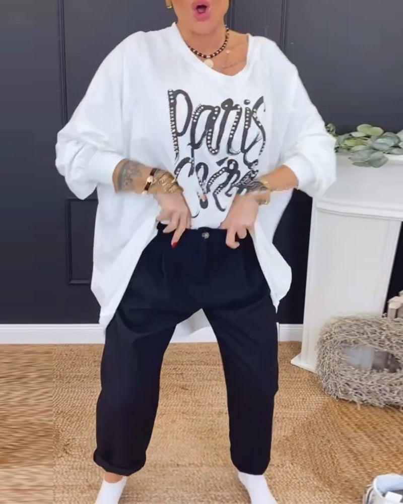 Top z okrągłym dekoltem i nieregularnym nadrukiem liter